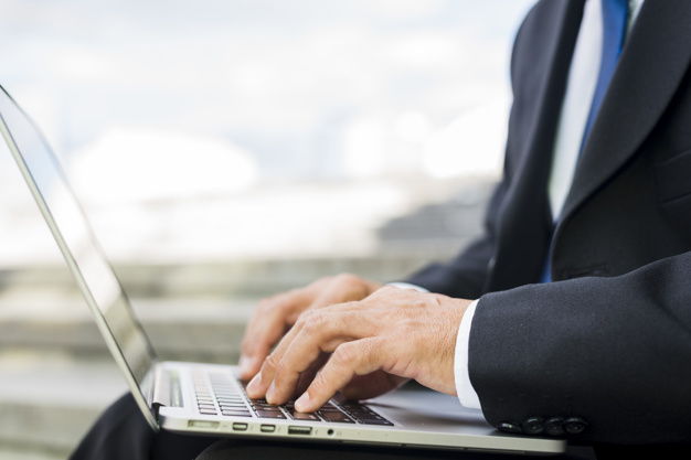 A man doing medical typing